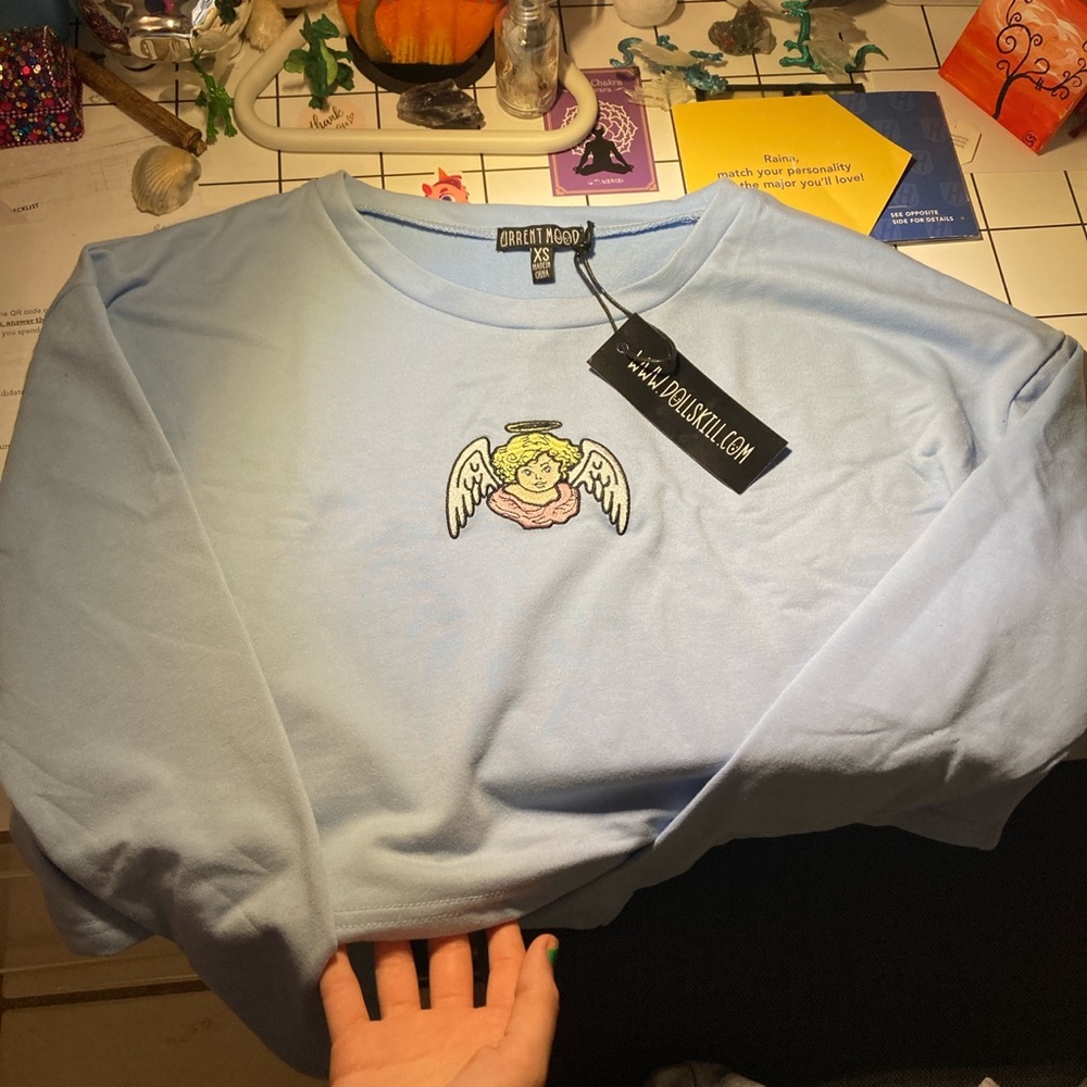Dollskill current mood, size xs. long sleeve angel crop top💙 new haven’t worn!!